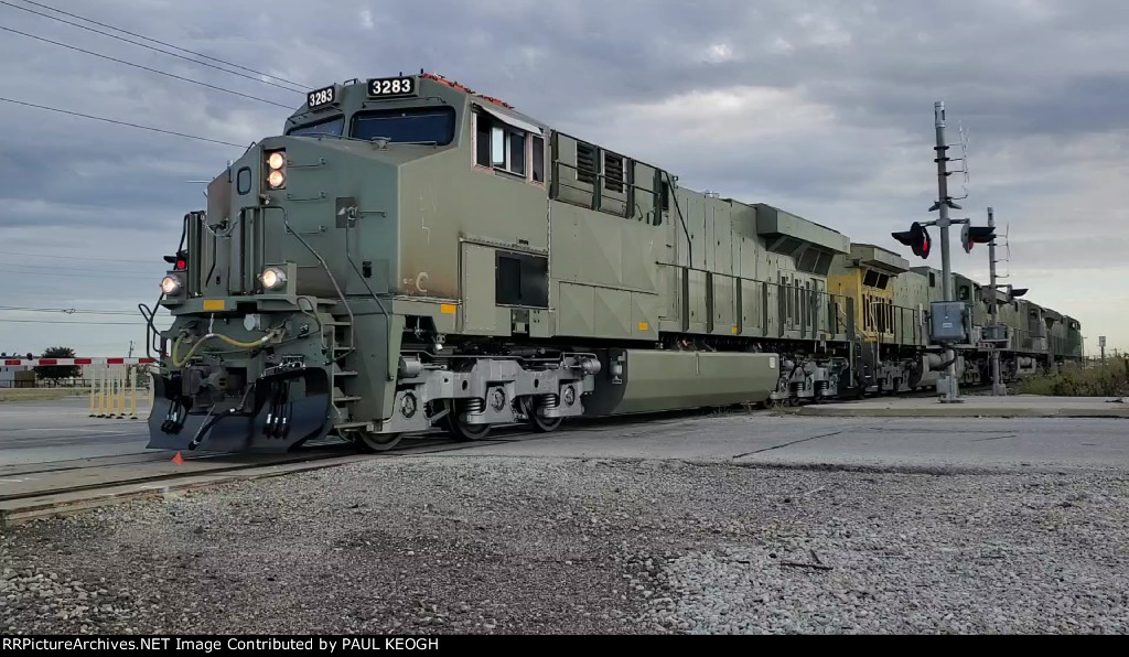 BNSF 3283 Leads A Consist of Newely Built/Remodeled Locomotives As She Rolls Southbound towards the Wabtec Locomotive Plant.  